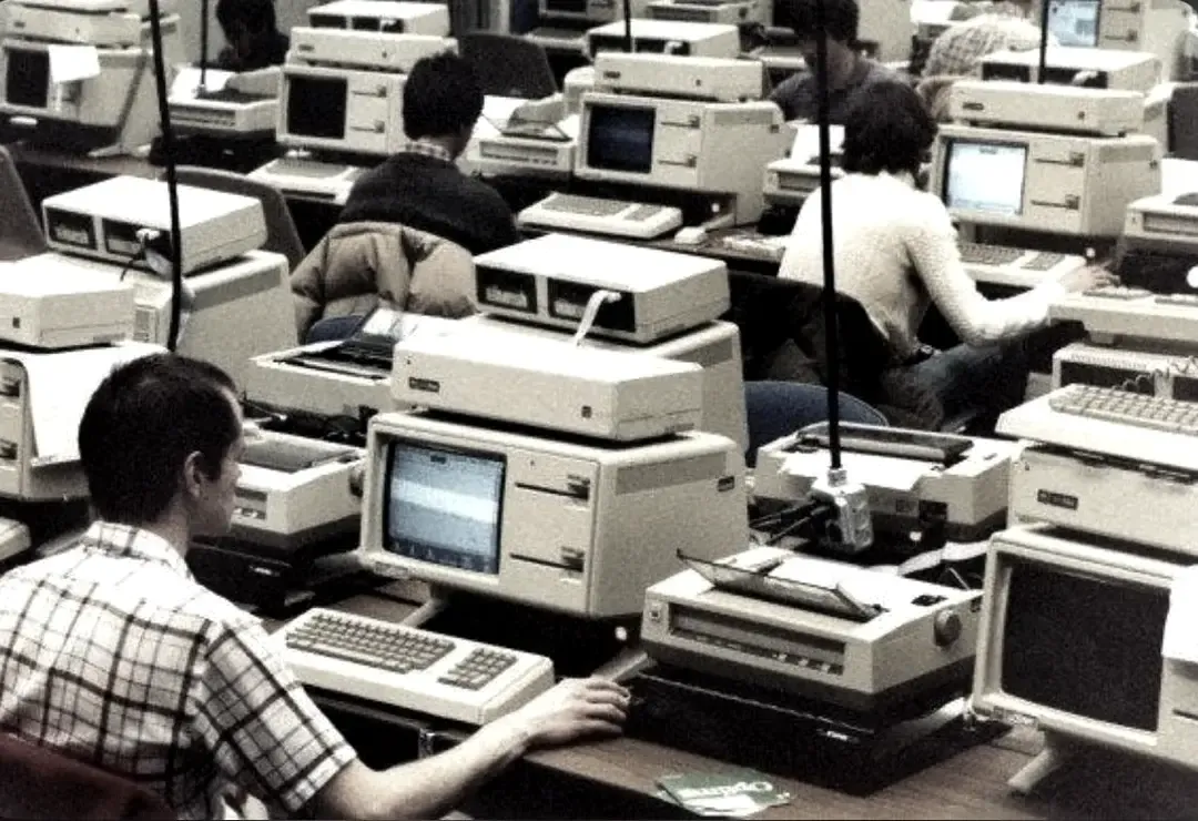 A 1980s office floor of terminals